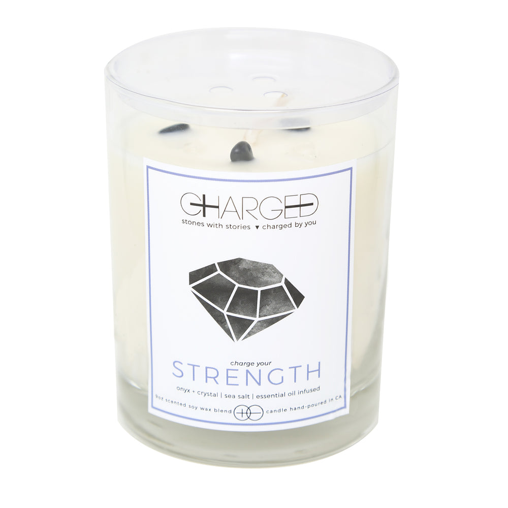Onyx Sea Salt Scented Soy Candle with Crystals on white