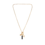Charged Onyx Pendant and Charms Toggle Necklace on whiet